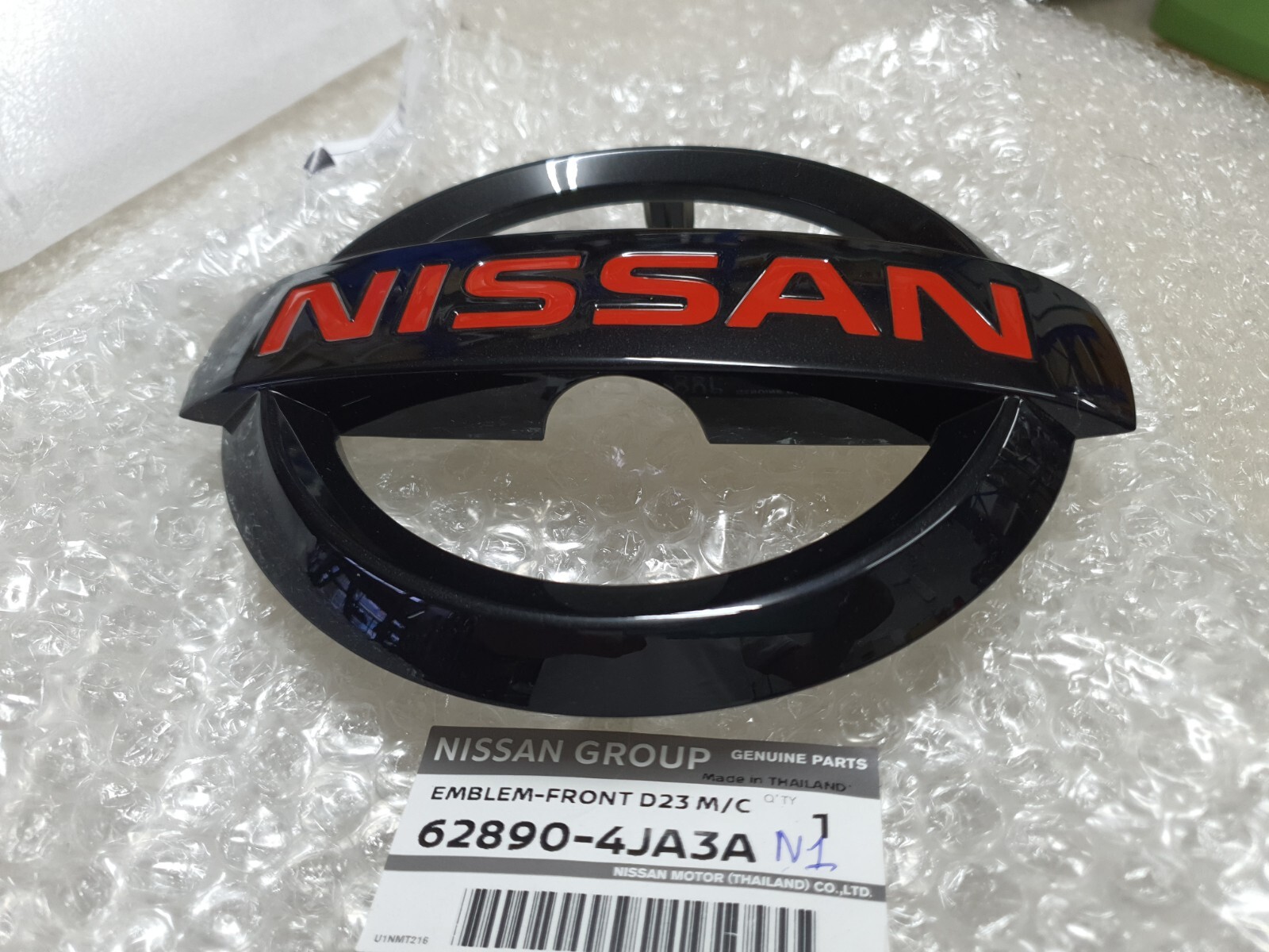 1X OEM FRONT GRILLE BLACK LOGO EMBLEM FOR NAVARA NP300 D23 M/C 2022