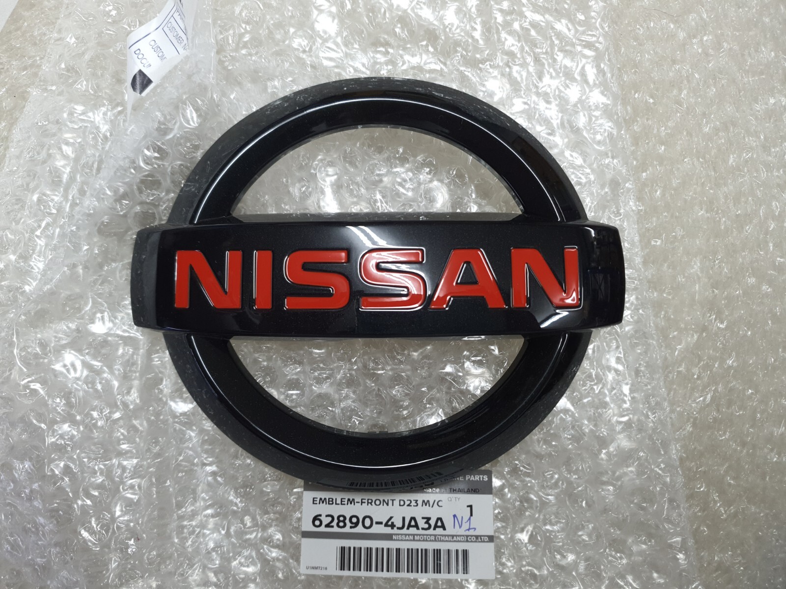 1X OEM FRONT GRILLE BLACK LOGO EMBLEM FOR NAVARA NP300 D23 M/C 2022